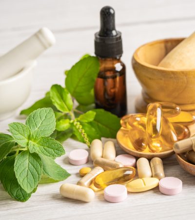 Alternative medicine herbal organic capsule drug with herbs leaf natural supplements for healthy good life.